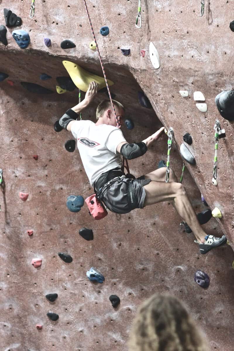 Climber working through a route