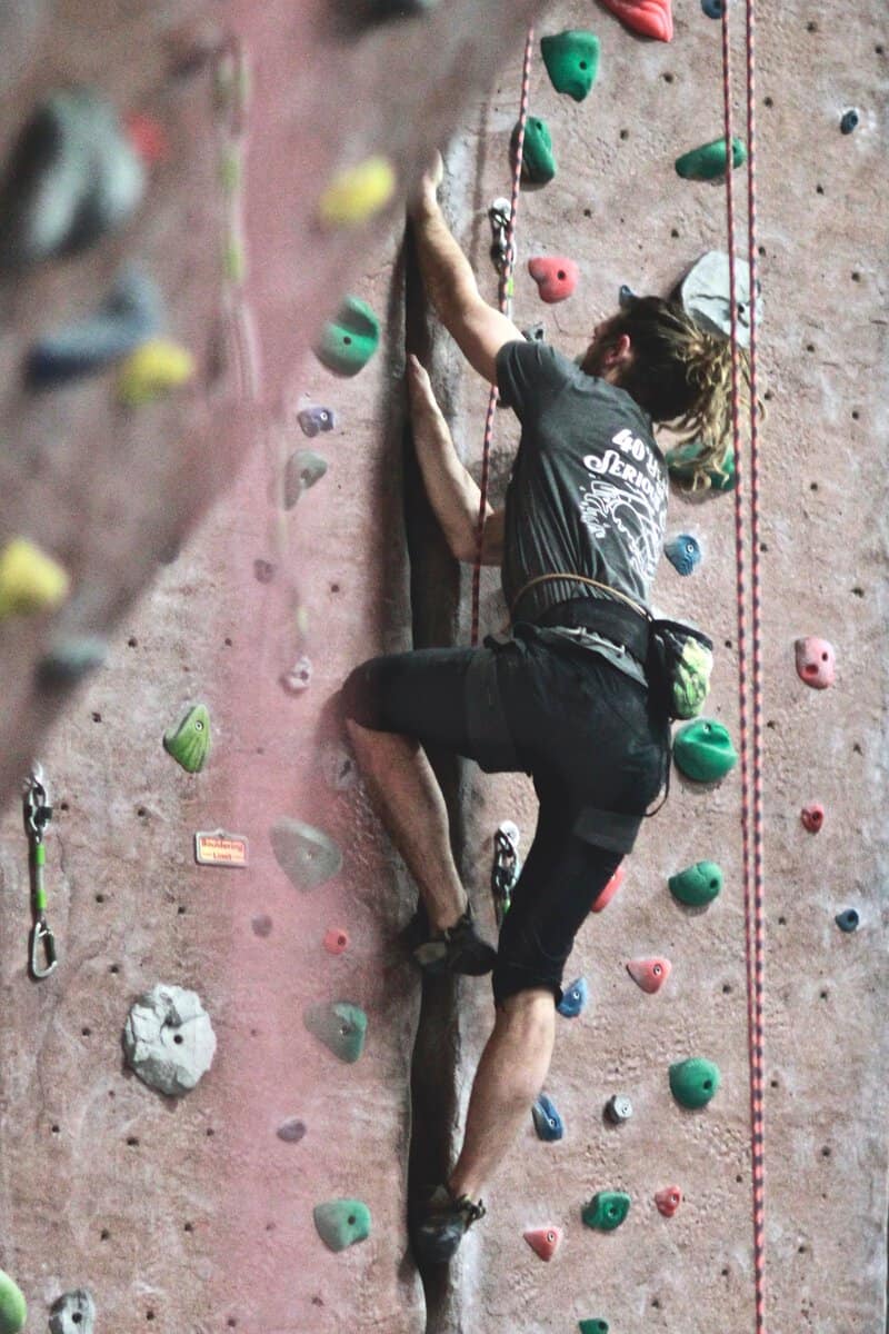 Climber on a vertical route
